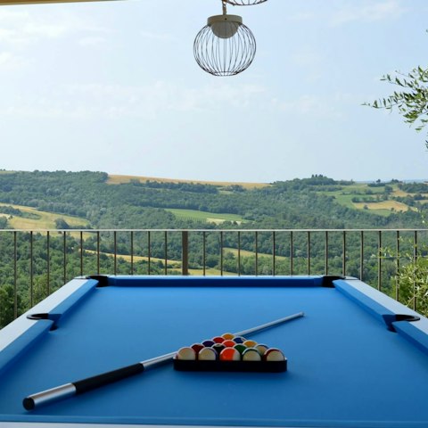Shoot some pool on the games' terrace