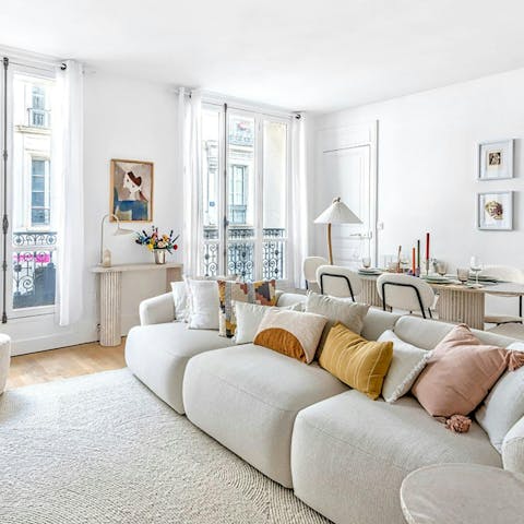 Sink into the plush sofa after a day exploring Paris