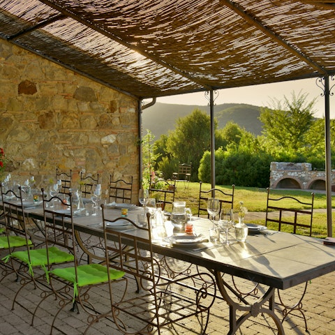 Gather for a barbecue at one of the two alfresco tables