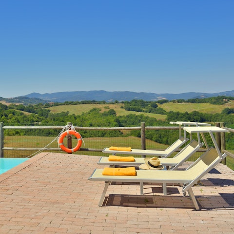 Gaze out over rolling hills from the pool terrace