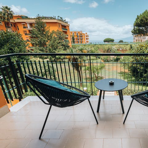 Enjoy sea views from the terrace and the communal citrus garden