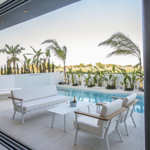 Hang out by the pool under the sky