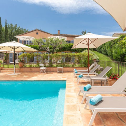 Sip a glass of rosé by the private pool