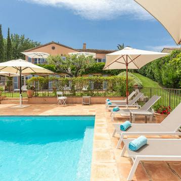 Sip a glass of rosé by the private pool