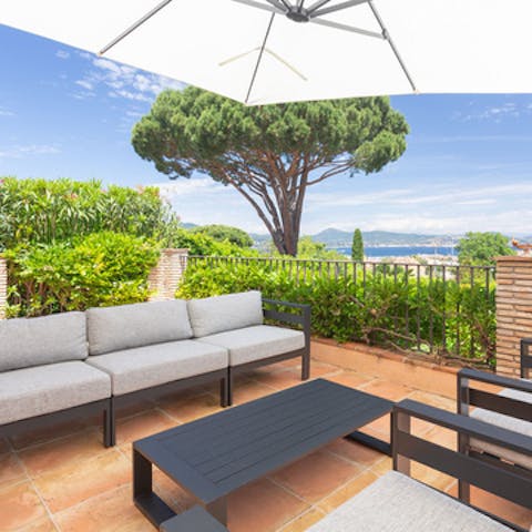 Soak up gorgeous views of the Mediterranean as you dine al fresco on the veranda