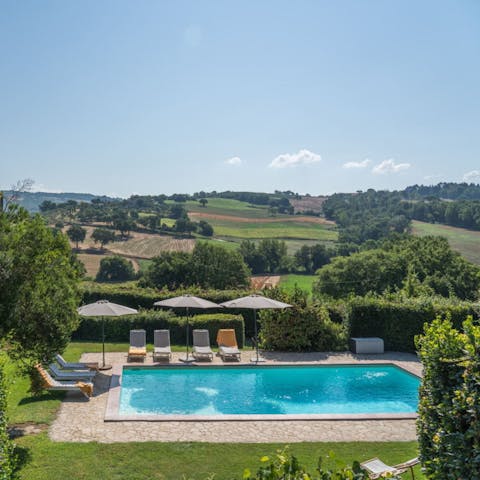 Admire the view from the private pool