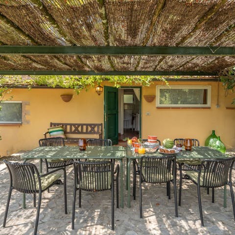 Enjoy al fresco meals under the pergola