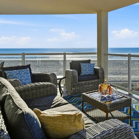 Head out onto the balcony for a glass of wine and a catch–up