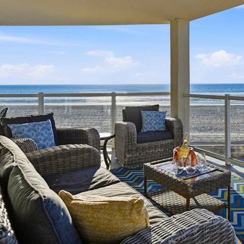 Head out onto the balcony for a glass of wine and a catch–up