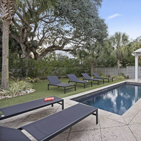 Relax and unwind by the private swimming pool