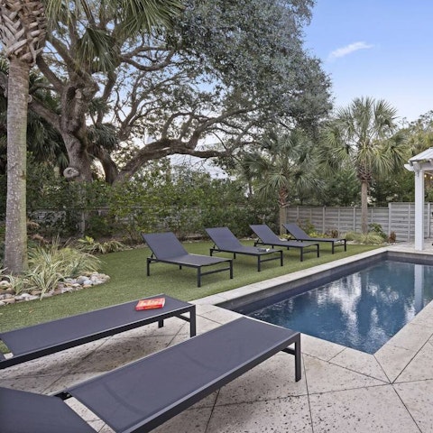 Relax and unwind by the private swimming pool