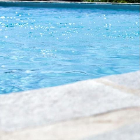 Dive into the communal swimming pool for a refreshing swim