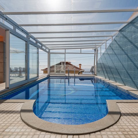 Relax and cool off in the private covered pool