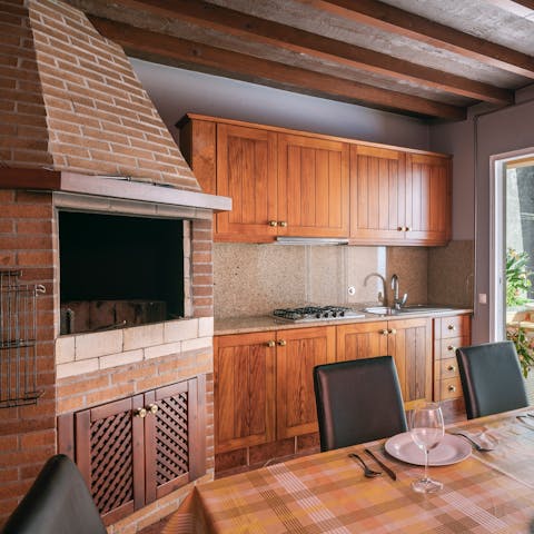 Cook rustic Portuguese feasts in the barbecue room