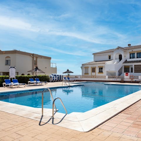 Enjoy a refreshing dip in the communal pool