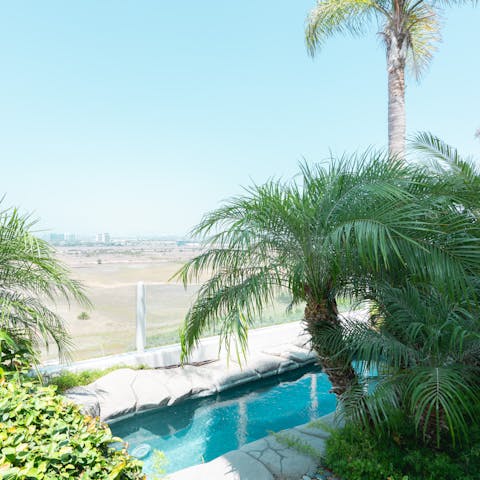 Recline in the secluded spa pool and admire the view