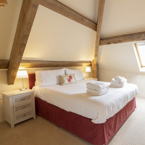Wake up to exposed wooden beams after a restful night, ready for another day of Torquay sightseeing