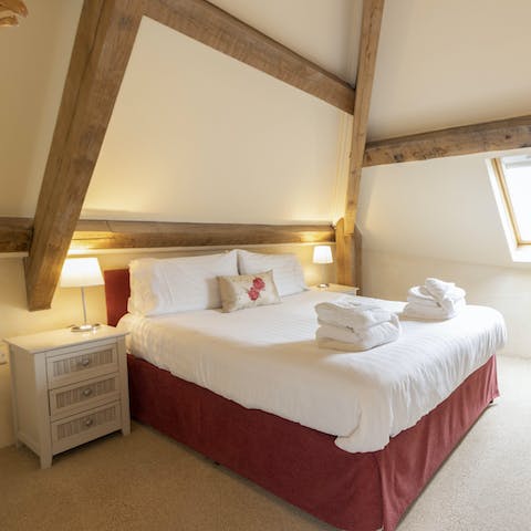 Wake up to exposed wooden beams after a restful night, ready for another day of Torquay sightseeing