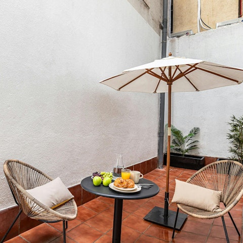 Unwind after a day of sightseeing in the private courtyard