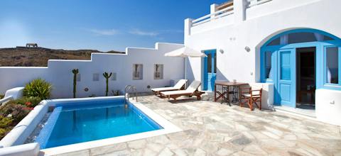 Cool off in the pool and relax on this patio, where you'll enjoy complimentary breakfasts