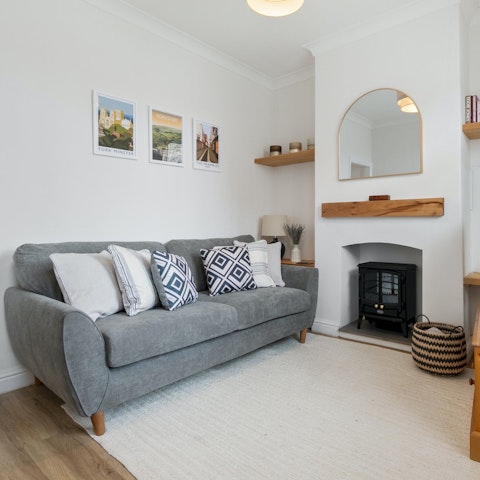 Curl up on the sofa with a good book and a glass of wine