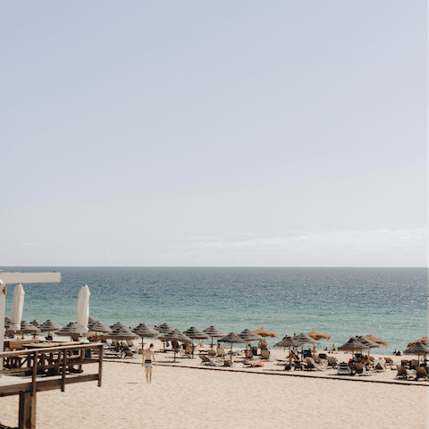 Pack your beach towel and sun cream and make the short journey to the sparkling white beach