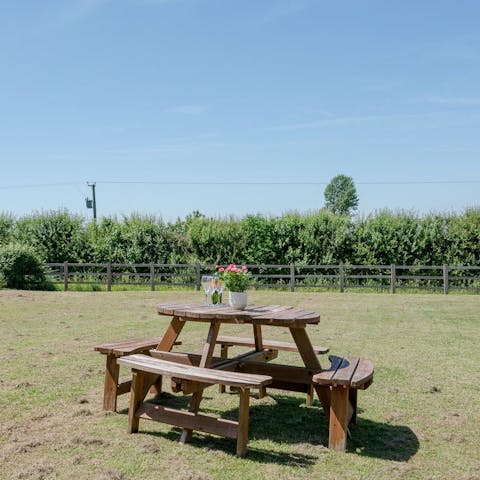 Grill lunch on the barbecue and dine alfresco on the lawn