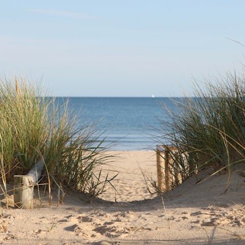 Spend the day at Hollywell Bay, a five-minute drive away