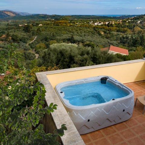 Treat yourself to a long, luxurious soak in the rooftop hot tub