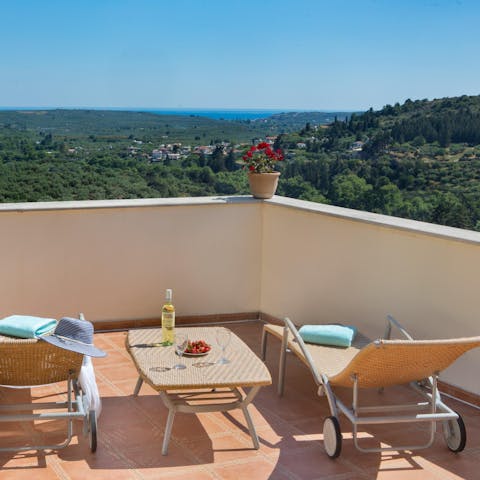 Stretch out on a sun lounger with a good book and a cold drink