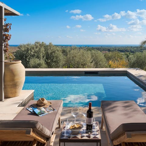 Splash in the private pool while admiring the views