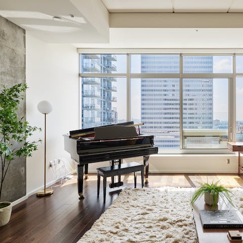 Admire the city views as you play the piano