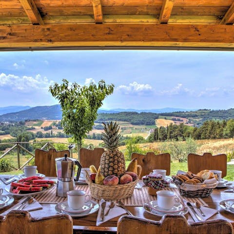 Start your day with breakfast on the covered terrace overlooking the Umbrian countryside