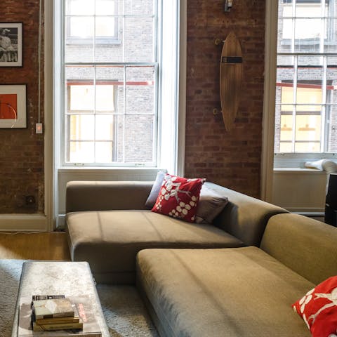 Take your bottle of wine from the cooler and enjoy a glass or two on the comfy sofa