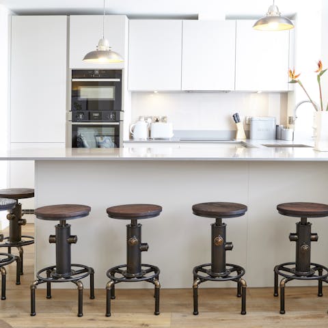 Start the day on a vintage stool at the big breakfast bar