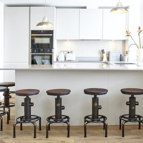 Start the day on a vintage stool at the big breakfast bar