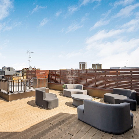 Share pre-dinner drinks on the roof terrace