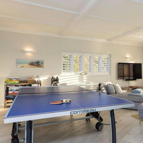 Play ping-pong or sing karaoke in the games room