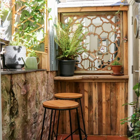 Sip your morning cuppa in the cosy, pint-sized courtyard