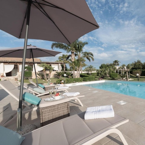 Enjoy the Sicilian sunshine by the pool