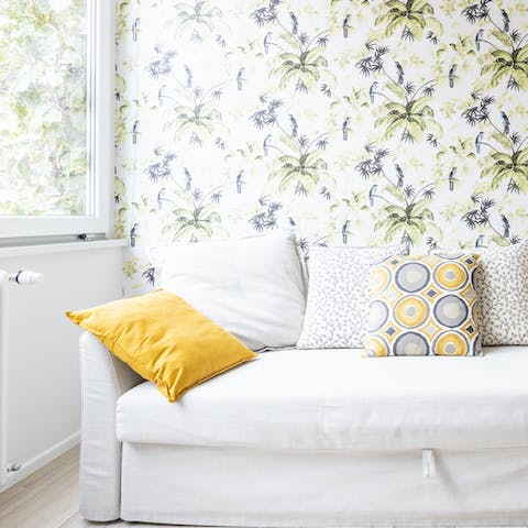 Kick back and relax on the plush sofa after a day exploring Rome