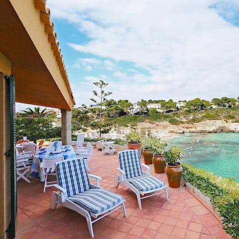 Sunbathe on the terrace overlooking the sea