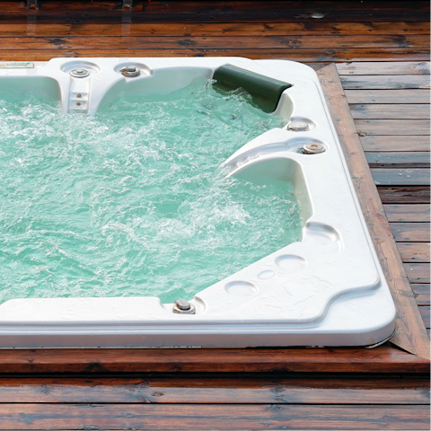 Unwind with a soak in the shared hot tub