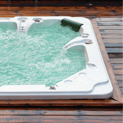 Unwind with a soak in the shared hot tub