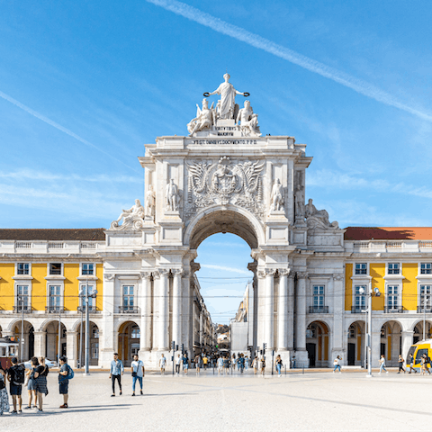 Stroll down to the Praça do Comércio to admire the historic art