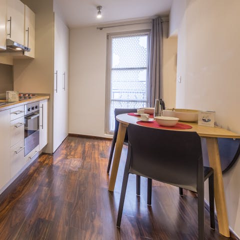 Share your meals at the dining table in the bright kitchen