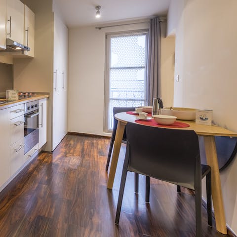 Share your meals at the dining table in the bright kitchen