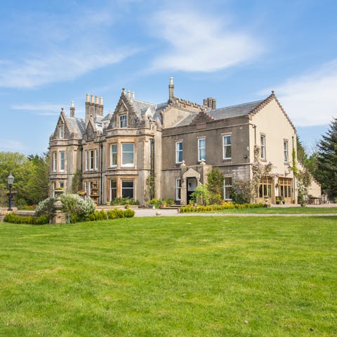 Explore seven acres of Scottish countryside from this baronial home