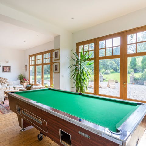 Challenge friends and family to game of pool
