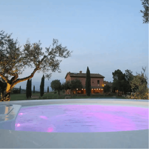 Indulge yourself with a chromotherapy session in the hot tub